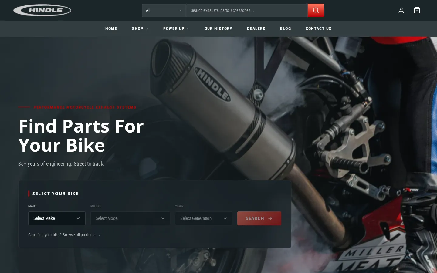 Homepage of a motorcycle exhaust store on Shopify with a find parts by bike search, desktop view
