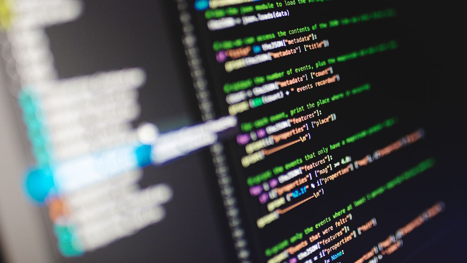 Lines of colourful code on a computer monitor